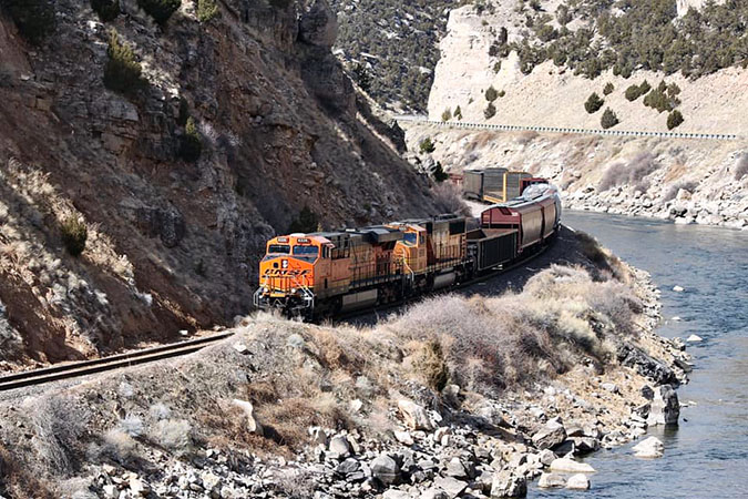 BNSF train passing through Wind River Canyon, Wyoming